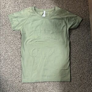 Athleta Sage Green Short Sleeve momentum tee retail is 50$ or more
